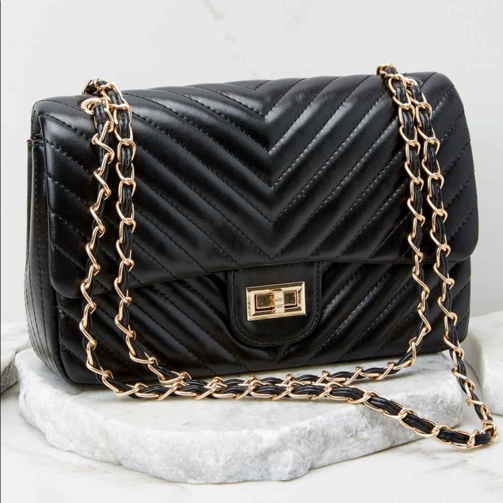 Black quilted handbag